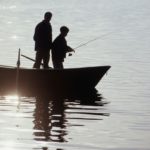 Connected father and son fishing